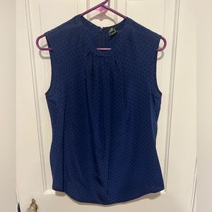 Blue blouse with black polka dots